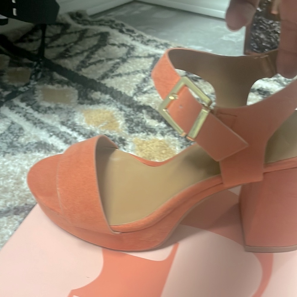 So cute! Coral color size 6 1/2 never worn